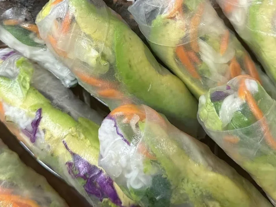 Avocado Spring Rolls - Fresh and healthy spring rolls filled with creamy avocado and crisp vegetables.